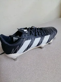 Blue and white Adidas rugby boots for only R1200