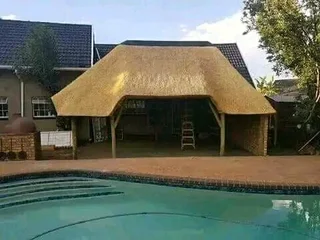 Thatch roof and all repairs install new lapas roundovel and Gazebo