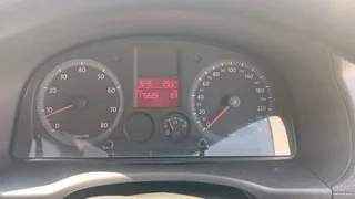 White Volkswagen Caddy 1.6  model 2012