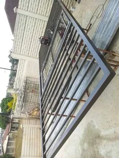 We do steel structure, carport, install garage door, install gates motor, pallised, driver way gates