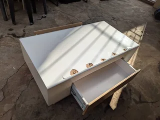 Sitting Room center table with side drawers available for sale .