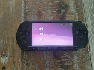 Sony PSP Street + Memory Card + Original Charger + Free Case (Ready to Play) - R1550