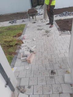 Natural grass and cobbles paving