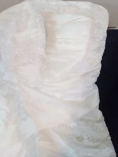 Wedding dress, size 32&#43;ring cushion.