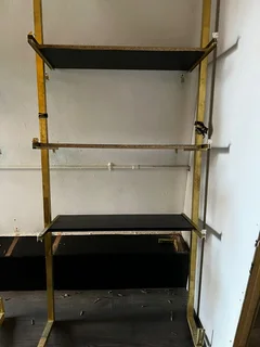 Gold and bkack Shelving