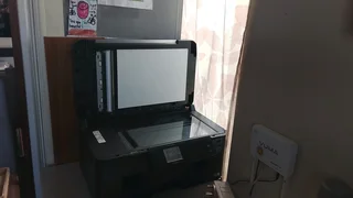 A touchscreen printer with ink in great condition