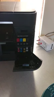 A touchscreen printer with ink in great condition