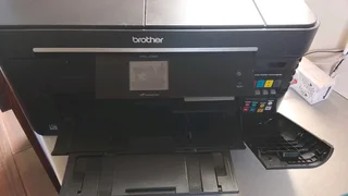 A touchscreen printer with ink in great condition