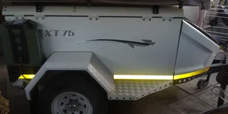 Camping trailer Xt75 with howling moon delux trailer tent