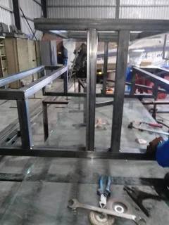 Steel design carport, pallised, desk and steel chair