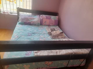 Wooden double bed