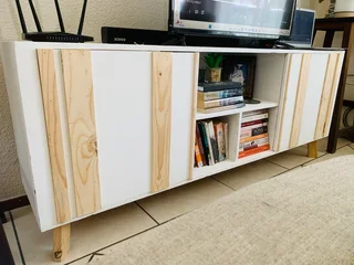 TV stand with sliding doors. Brand new ones available