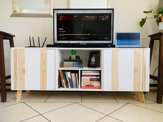 TV stand with sliding doors. Brand new ones available