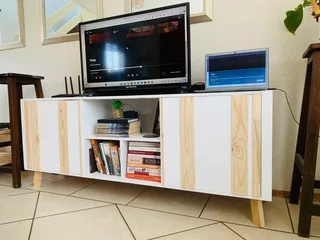 TV stand with sliding doors. Brand new ones available