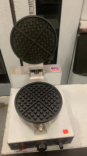 Perfect Waffles. One at a Time. 劉 Craft café-quality waffles with this single waffle maker—designed