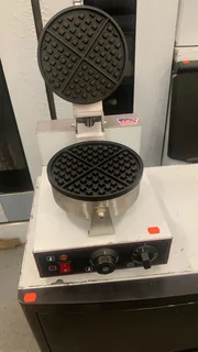 Perfect Waffles. One at a Time. 劉 Craft café-quality waffles with this single waffle maker—designed