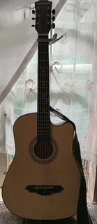 Sanchez guitar with a capo, guitar strap and  3 guitar pics