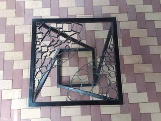 “Modern Edge: Custom Steel &amp; Glass Coffee Table”