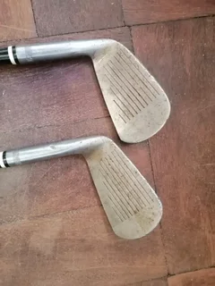 Two secondhand vintage Bogey Sun Lines Deluxe Golfclubs number 5 and 7.