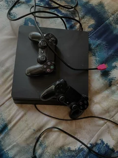PS4 Slim, 3 games &amp; 2 controllers