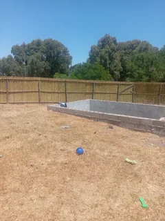 Bamboo fencing and wooden pannels.