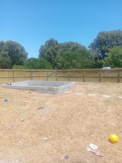 Bamboo fencing and wooden pannels.