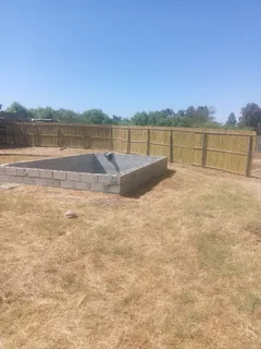 Bamboo fencing and wooden pannels.