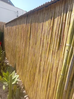 Bamboo fencing and wooden pannels.