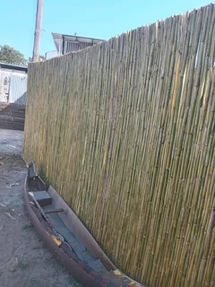 Bamboo fencing and wooden pannels.