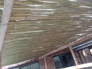 Bamboo fencing and wooden pannels.