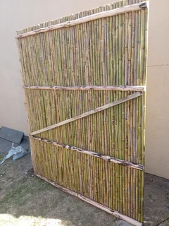 Bamboo fencing and wooden pannels.