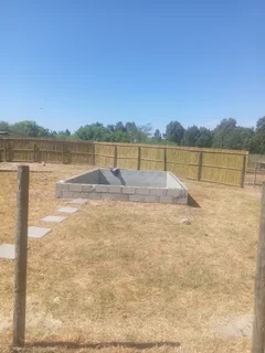 Bamboo fencing and wooden pannels.