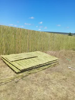 Bamboo fencing and wooden pannels.