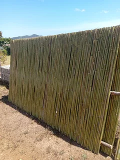 Bamboo fencing and wooden pannels.