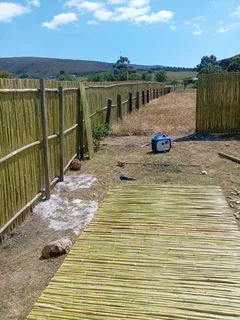 Bamboo fencing and wooden pannels.
