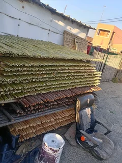 Bamboo fencing and wooden pannels.