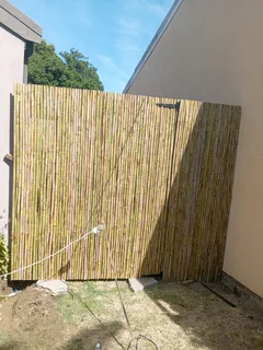 Bamboo fencing and wooden pannels.