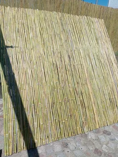 Bamboo fencing and wooden pannels.