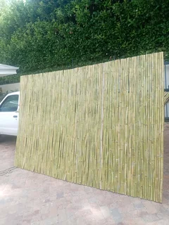 Bamboo fencing and wooden pannels.