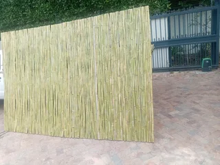 Bamboo fencing and wooden pannels.