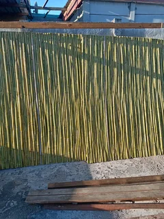 Bamboo fencing and wooden pannels.