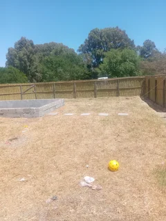 Bamboo fencing and wooden pannels.