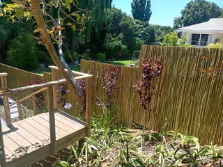 Bamboo fencing and wooden pannels.