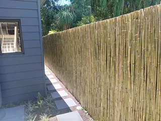 Bamboo fencing and wooden pannels.