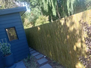 Bamboo fencing and wooden pannels.