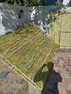 Bamboo fencing and wooden pannels.