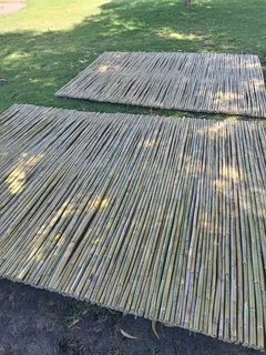 Bamboo fencing and wooden pannels.