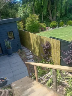 Bamboo fencing and wooden pannels.