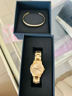 Daniel wellington Gold ladies watch and bracelet