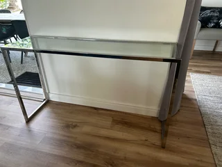 Coffee table and server from LIM Furniture-polished stainless steel and glass